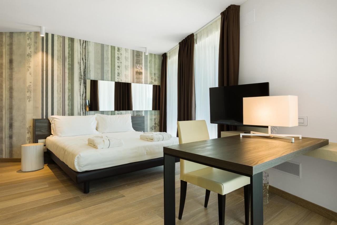 Suites Hotel Astor Belluno Buitenkant foto